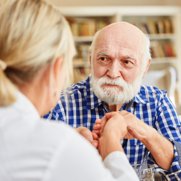 elderly father and adult daughter